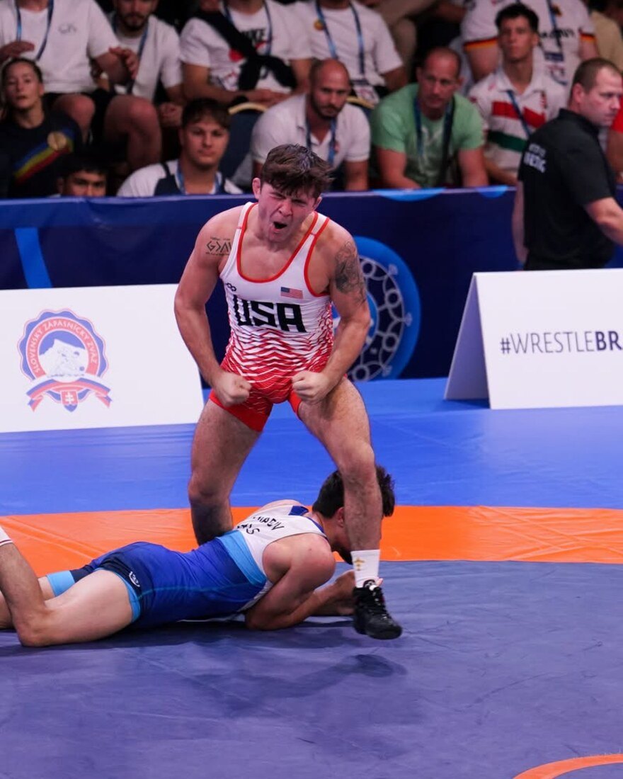 Bo Bassett roars after winning the 65 kg U20 world title in Bratislava