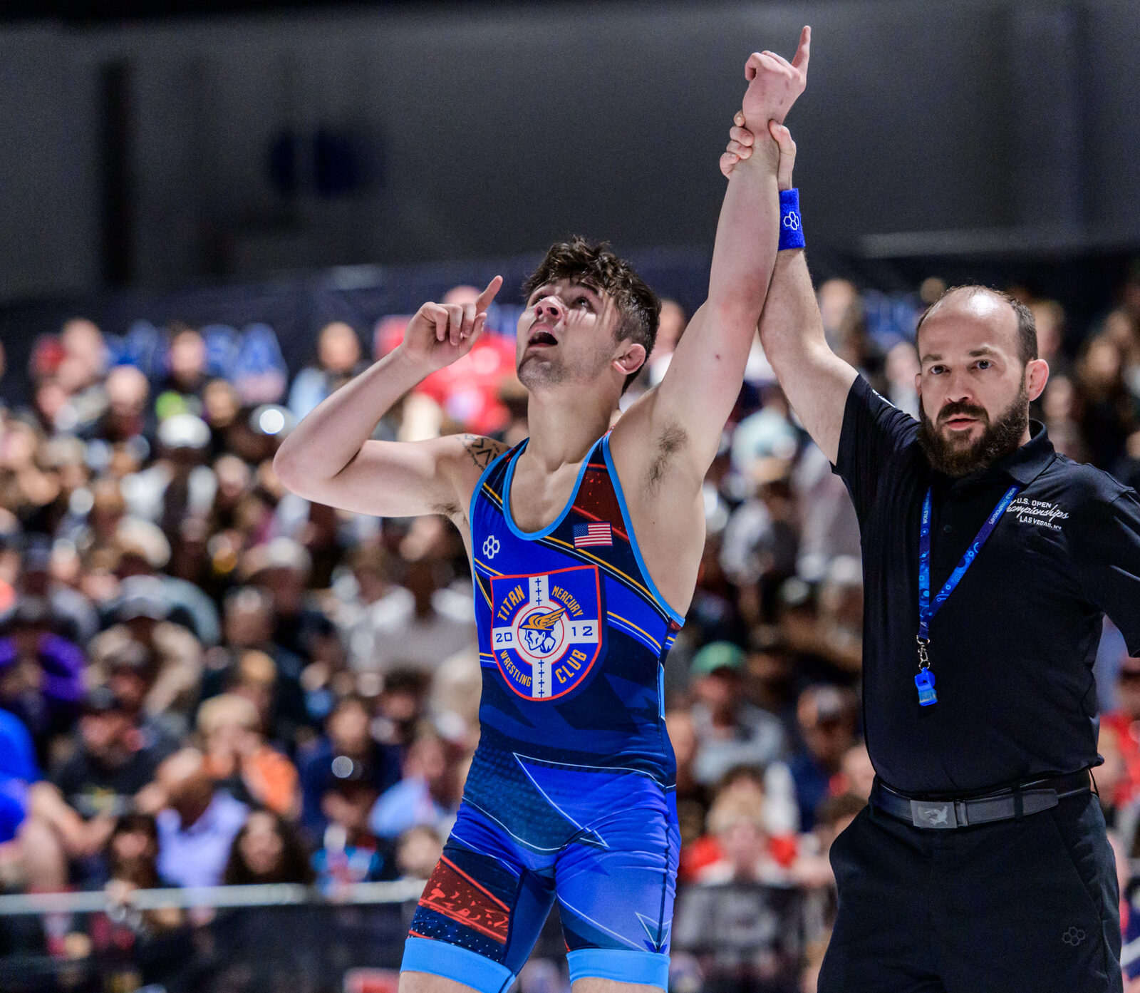 Bo Bassett gets his hand raised after a win at the U.S. Open