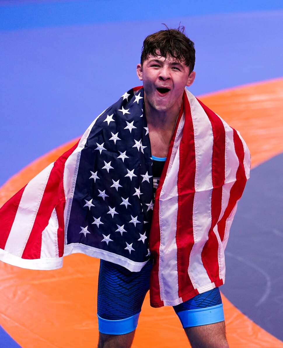 Bo Bassett wrapped in the American flag after winning the U20 world title